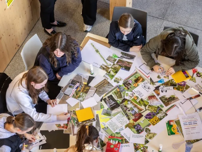 Girls working round a table